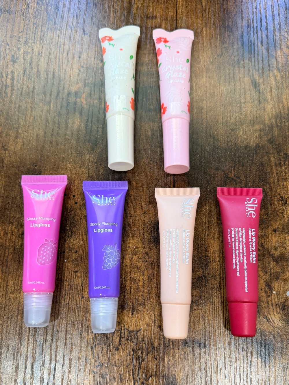 She Makeup lip assortment (2)Glossy Balm (2) Plumpers & (2) lip care glaze